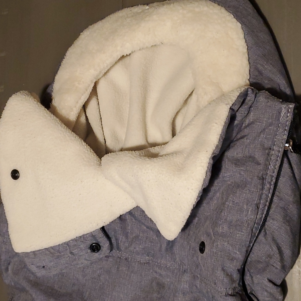 Infant car seat cover to keep baby warm